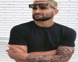 He is a tattoo lover and has various tattoos in his hand.